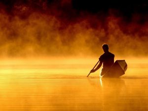 Nature___Rivers_and_lakes_A_man_in_a_boat_070956_