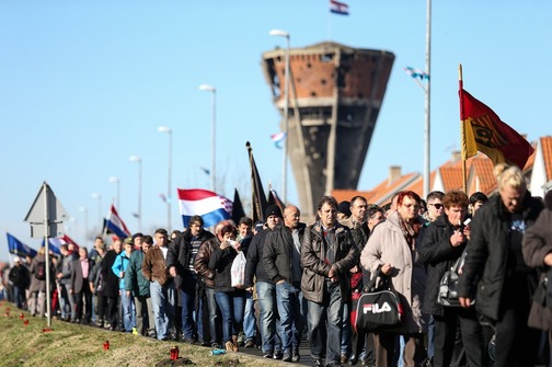 18.11.2014., Vukovar - Dan sjecanja na zrtvu Vukovara 1991. - 2014. pod sloganom Vukovar - mjesto posebnog pijeteta. 23. je obljetnica stradavanja i zrtve Vukovara u Domovinskom ratu. Sudionici Kolone sjecanja prolaze ulicama grada do Memorijalnog groblja zrtava iz Domovinskog rata gdje brojna izaslanstva polazu vijence i pale svijece, bas kao i na spomen-obiljezju masovne grobnice na Ovcari. Photo: Petar Glebov/PIXSELL